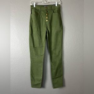 Abercrombie & Fitch green skinny pants. Jeans style. Button snap front. Size 27L